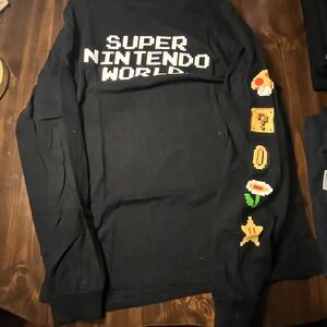 Universal Black Crewneck Sweater with Iconic Graphics